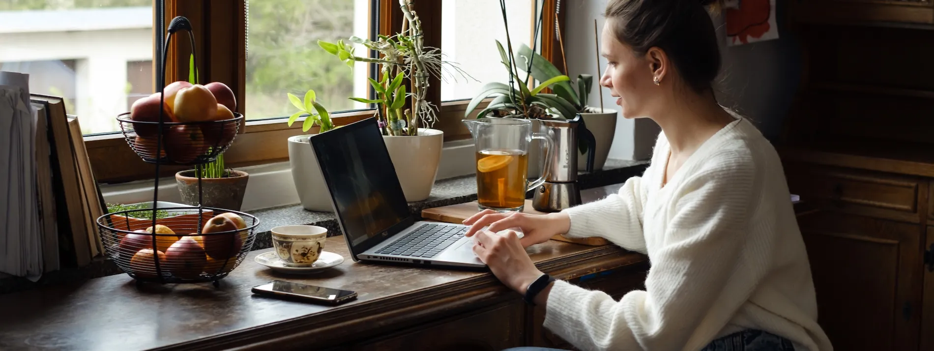 Freelancer working on a laptop at home