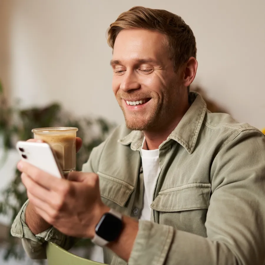 Person making a phone call with notes in hand